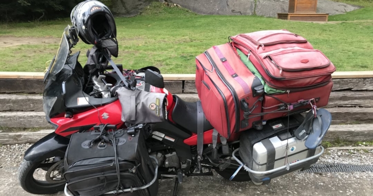 A Suzuki V-Strom heavily laden with luggage