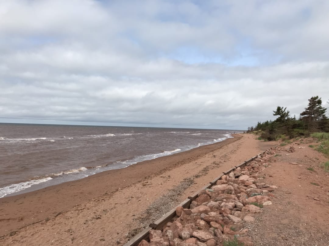 The red sand beach at West Point PEI
