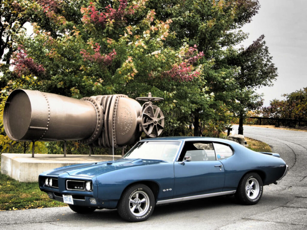 a photo of a blue 1969 Pontiac GTO