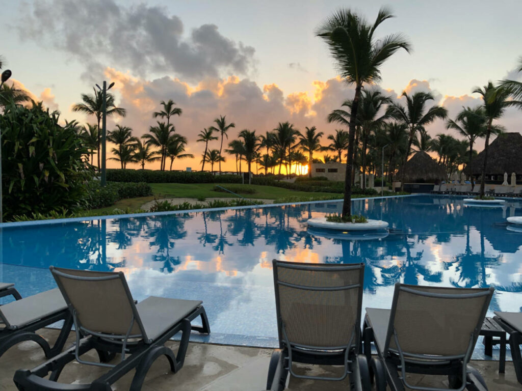 Sunrise over a resort swimming pool in Punta Cana