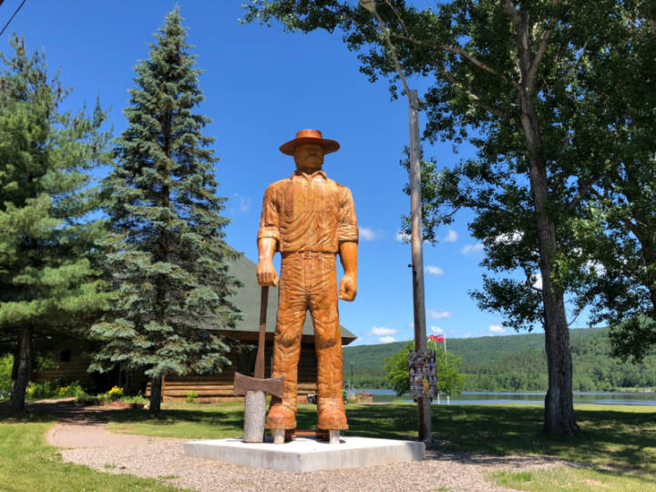 a photo of a wooden statue of Big Joe Mufferaw in Mattawa, Ontario